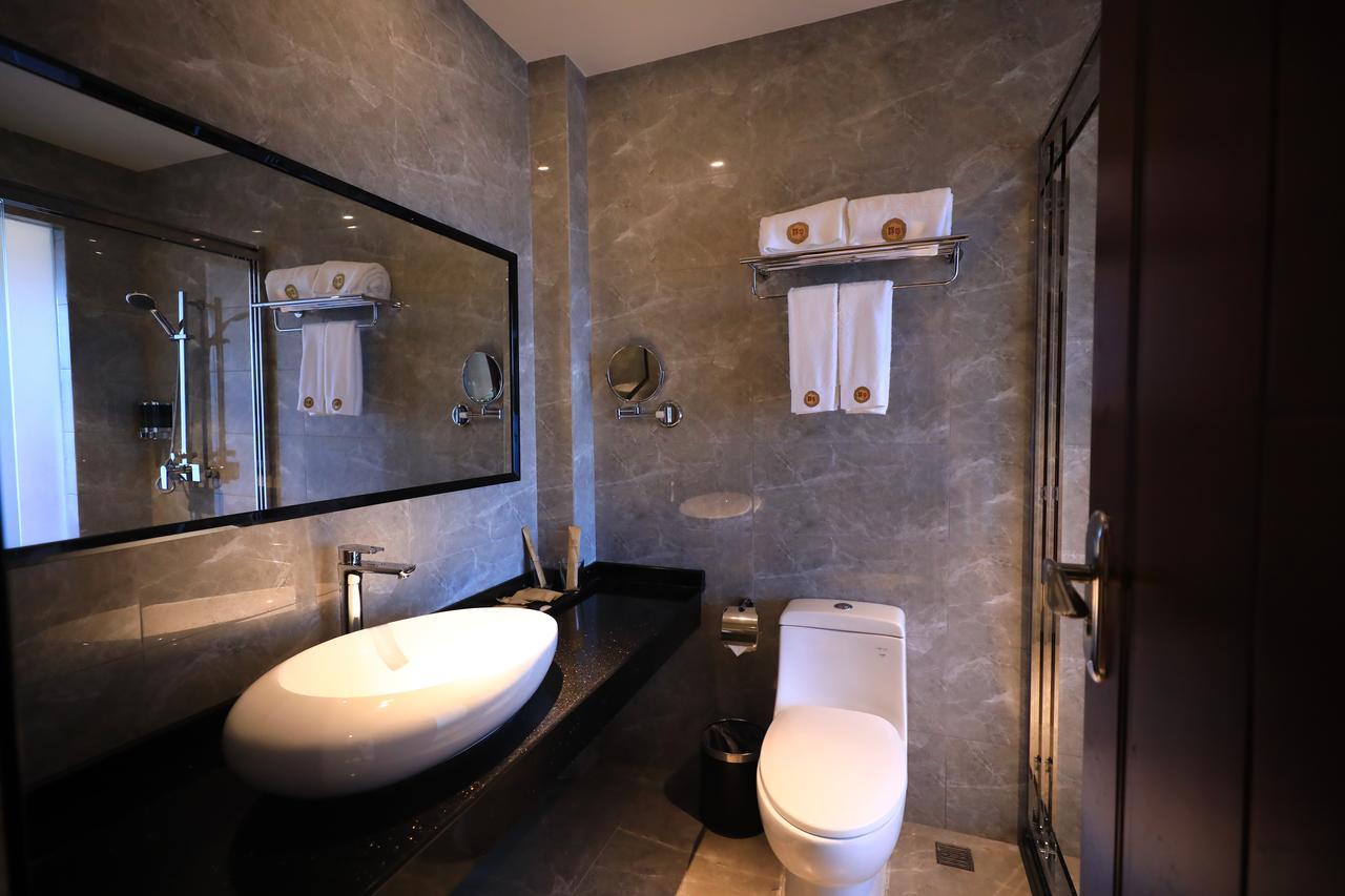 Tf Seaside Hotel Garapan Bagian luar foto