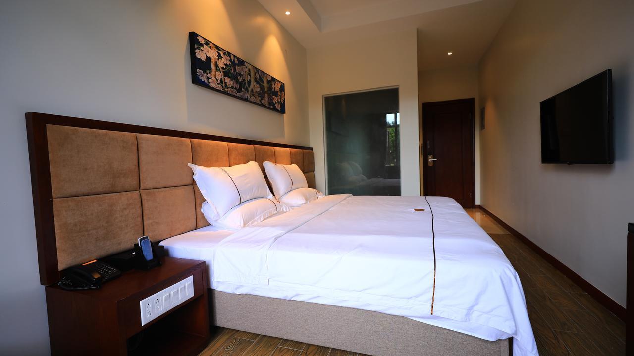 Tf Seaside Hotel Garapan Bagian luar foto