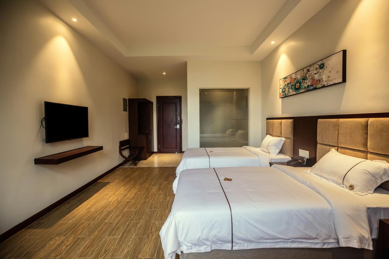 Tf Seaside Hotel Garapan Bagian luar foto