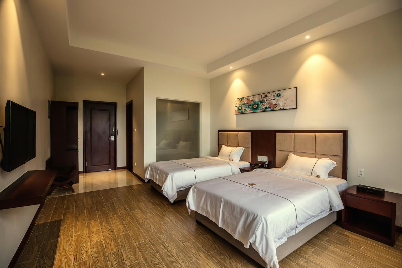 Tf Seaside Hotel Garapan Bagian luar foto