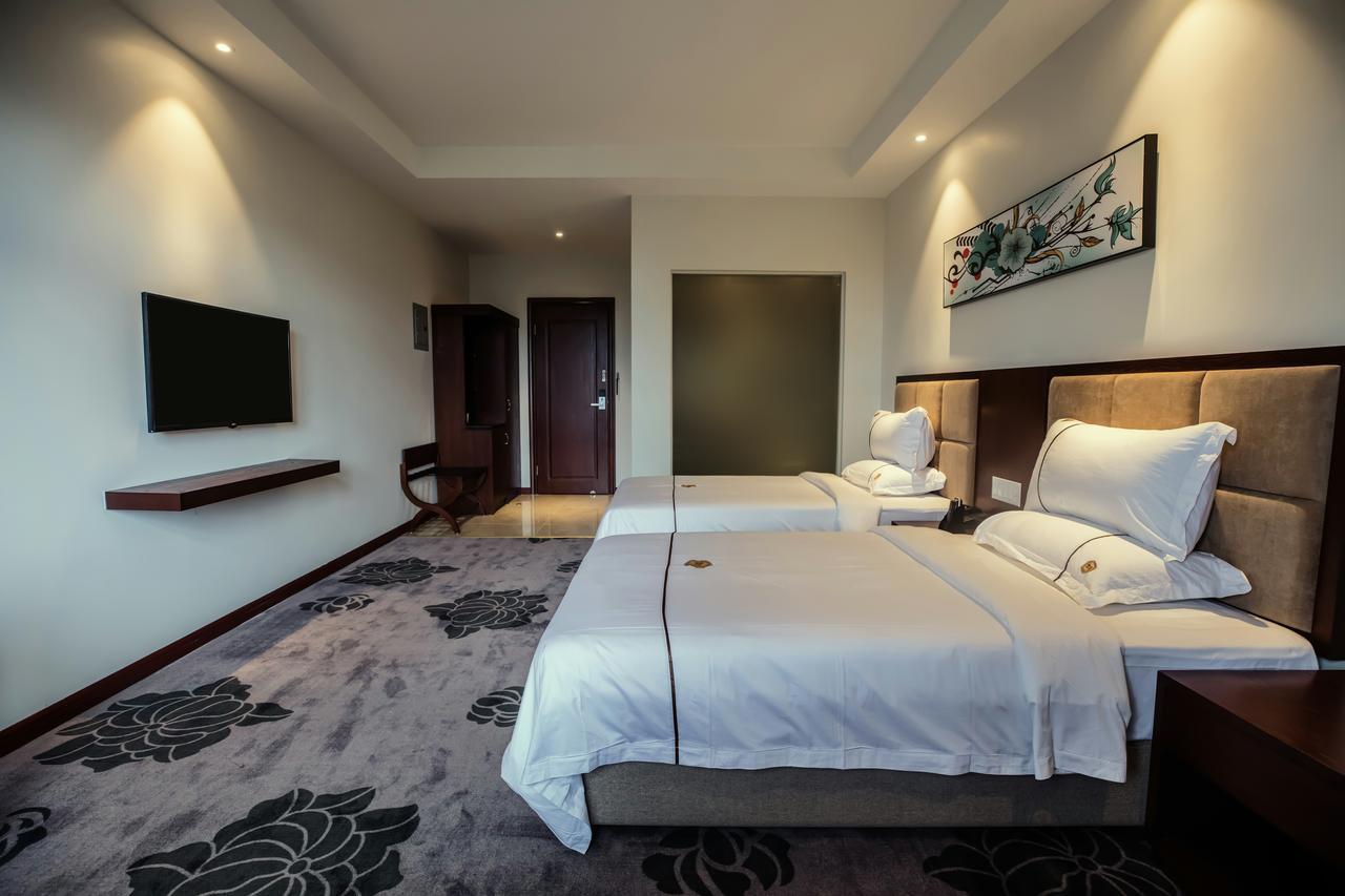 Tf Seaside Hotel Garapan Bagian luar foto