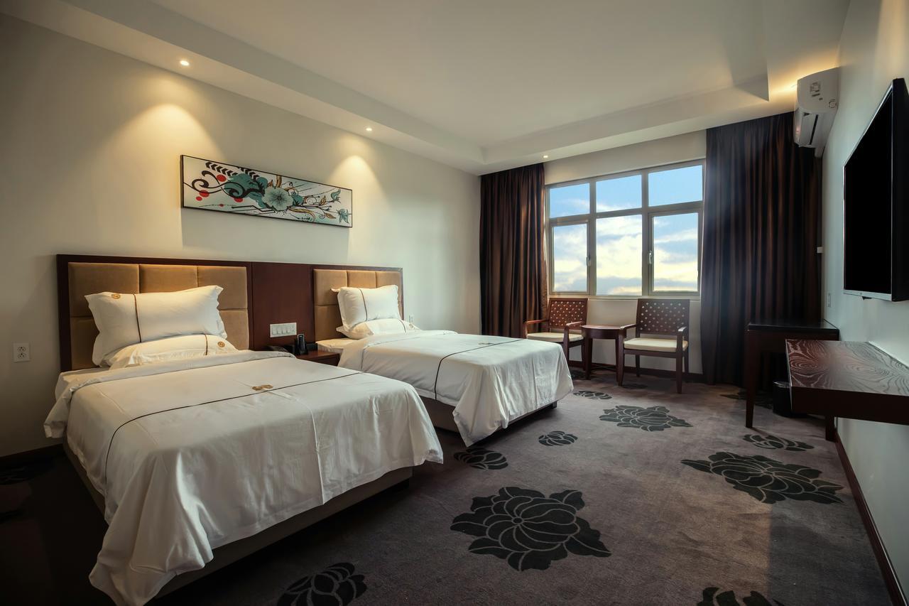 Tf Seaside Hotel Garapan Bagian luar foto